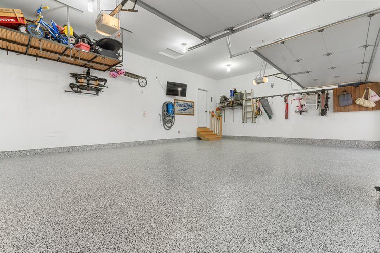 Multi-bay garage with polished flake floor coating