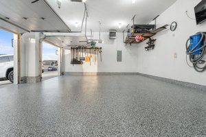 Finished flake-coated garage floor by Confluence Coatings